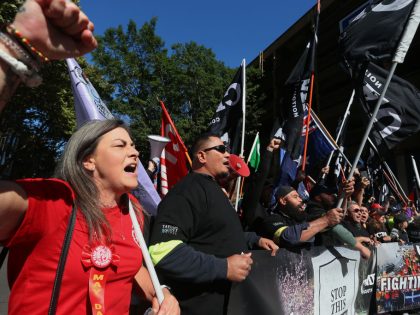 People Take Part In May Day Rally