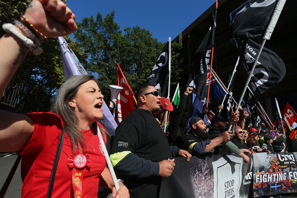 People Take Part In May Day Rally