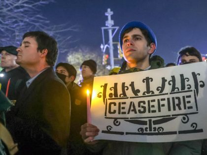 Jewish groups protest demand a ceasefire for Gaza on the first night of Hanukkah in NYC