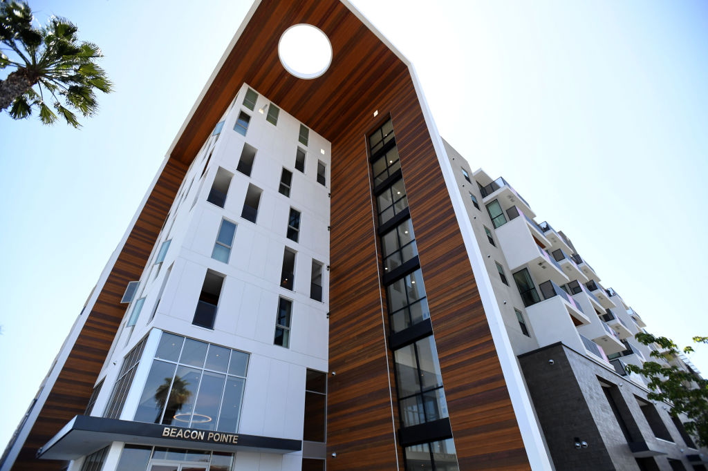 A senior living facility celebrates opening a bit late due to COVID-19.