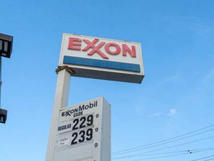 A view of an Exxon logo at a Gas Station in Flushing,