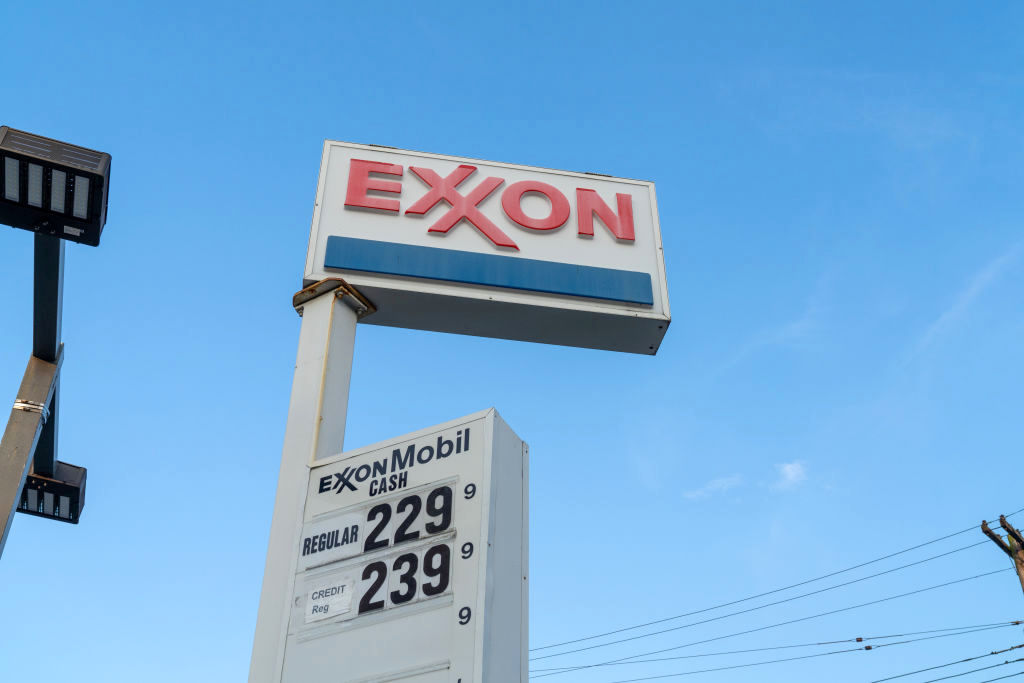 A view of an Exxon logo at a Gas Station in Flushing,