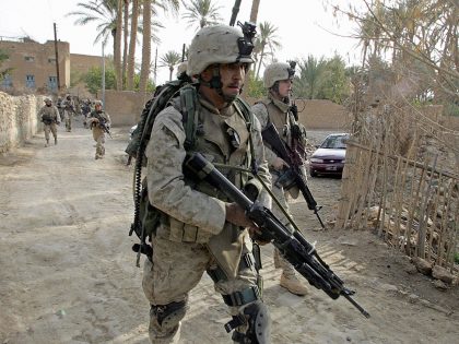 US Marines from the 1st Battalion patrol