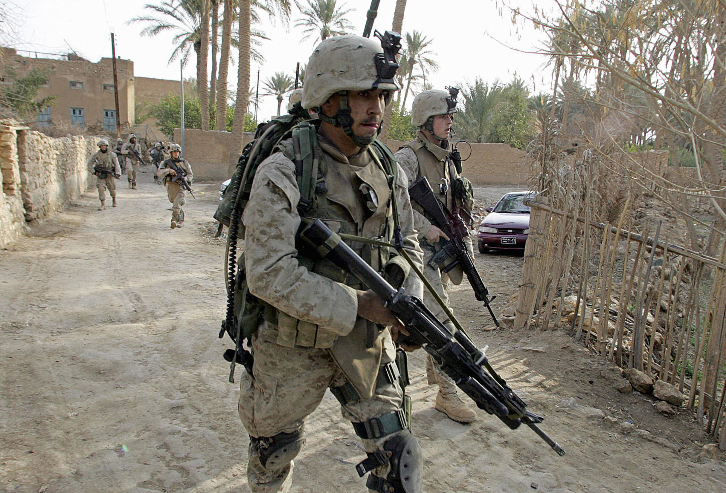 US Marines from the 1st Battalion patrol