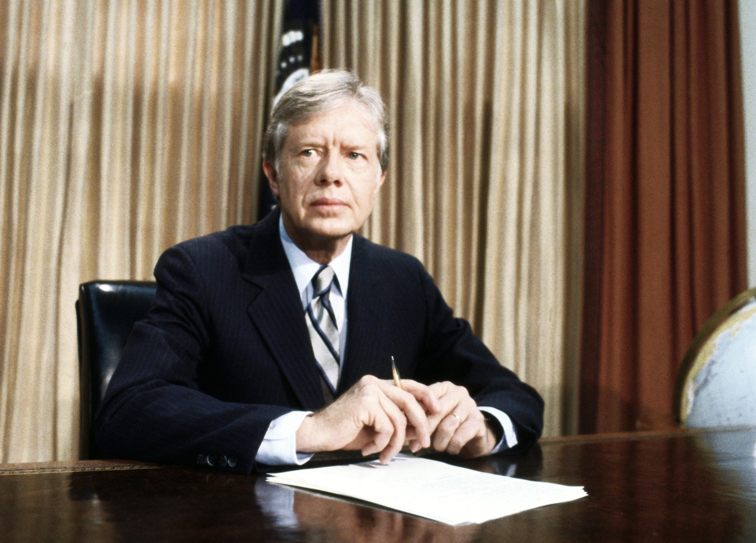 President Jimmy Carter Seated at Desk