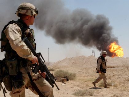 Army Watches Burning Oil