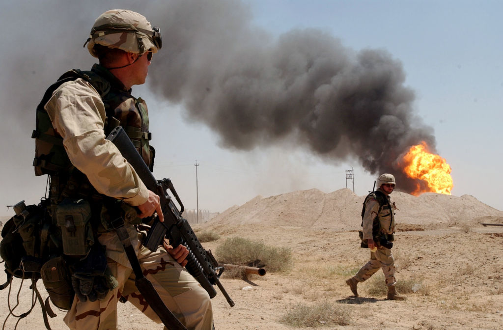 Army Watches Burning Oil