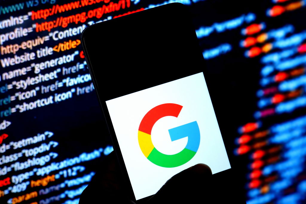 In this Photo illustration a Google logo seen displayed on