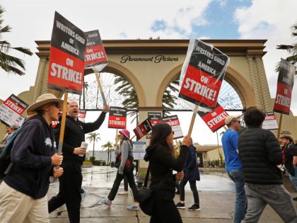 On day three of the Writers Guild of America strike, a large group picket in front of Paramount Studio gate on May 4, 2023.