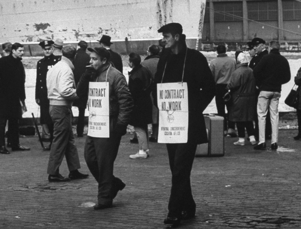 Wary picketers, during International Lon