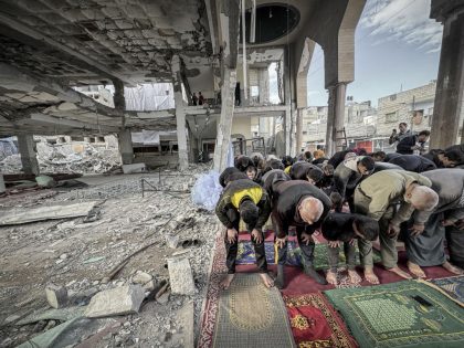 Palestinians perform prayers at Al-Huda Mosque in Rafah