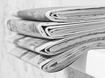 Newspapers on Table