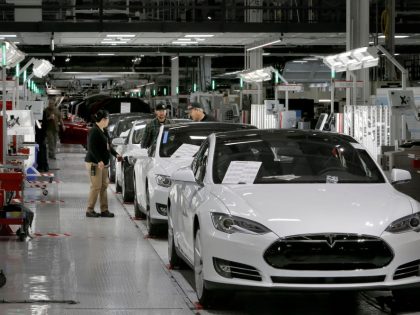 The end of the assembly line where a quality control inspection takes place at Tesla Motors, California's only full-scale auto manufacturing plant, as seen on Thurs. Feb. 19, 2015, in Fremont, Calif.
