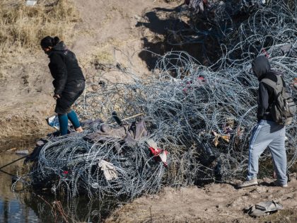 Migrants At The US-Mexico Border As Texas Increases Security