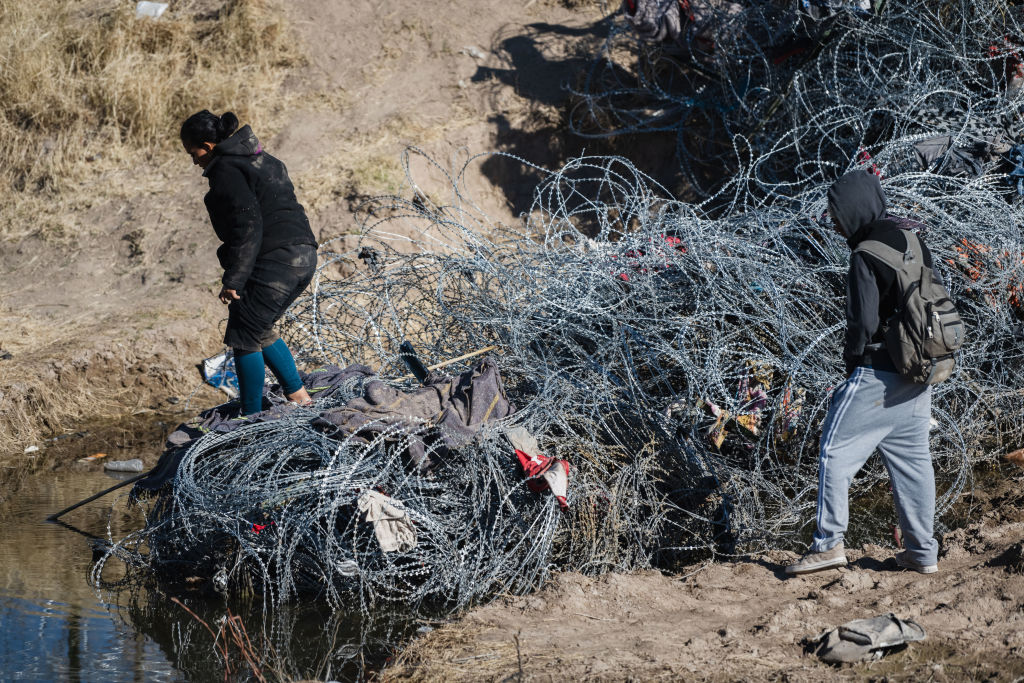 Migrants At The US-Mexico Border As Texas Increases Security