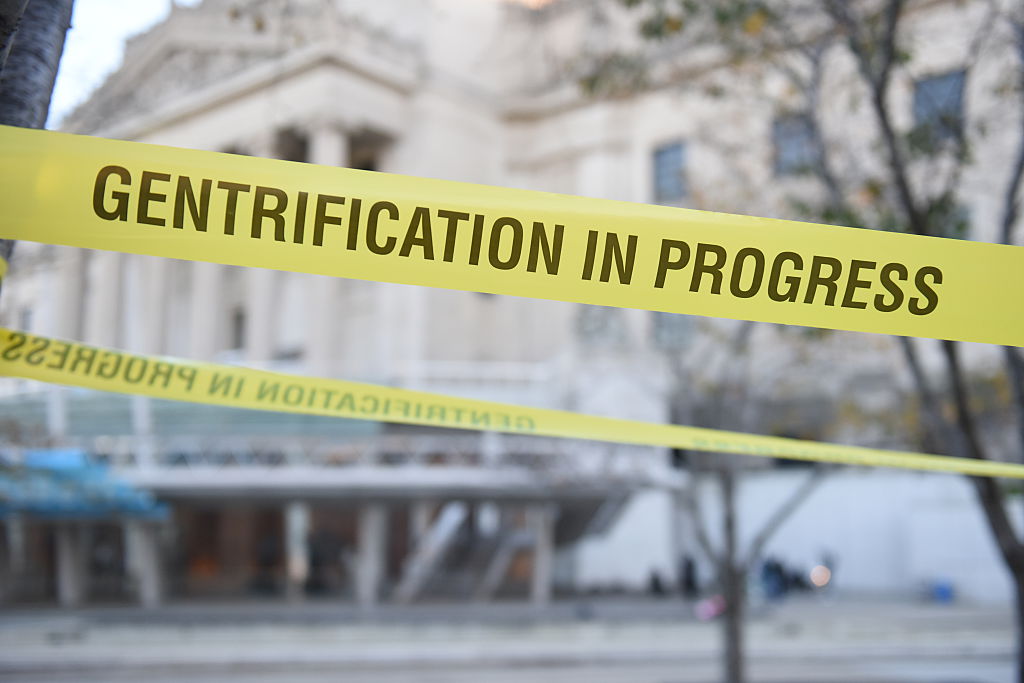 Gentrification In Progress tape in front of Brooklyn Museum