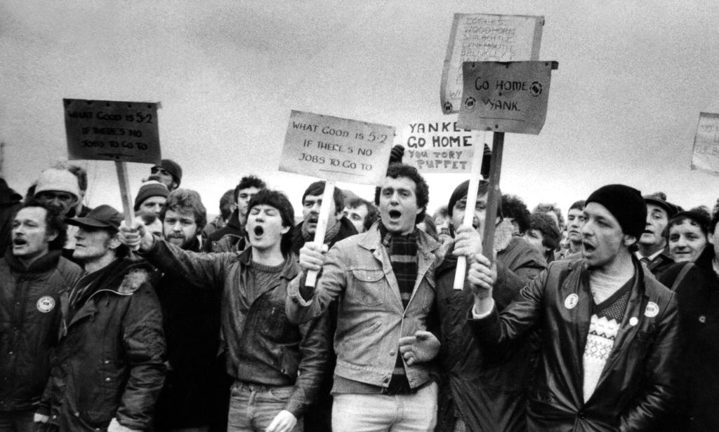 The National Miners Strike 1984  An angry crowd of around 400 jeering miners blockaded National Coal Board boss Ian McGregor inside a  colliery office at Ellinton Colliery 22 February 1984