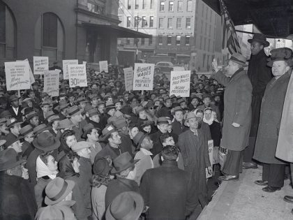 Striking Meat Workers Carrying Signs Listen at Rallie