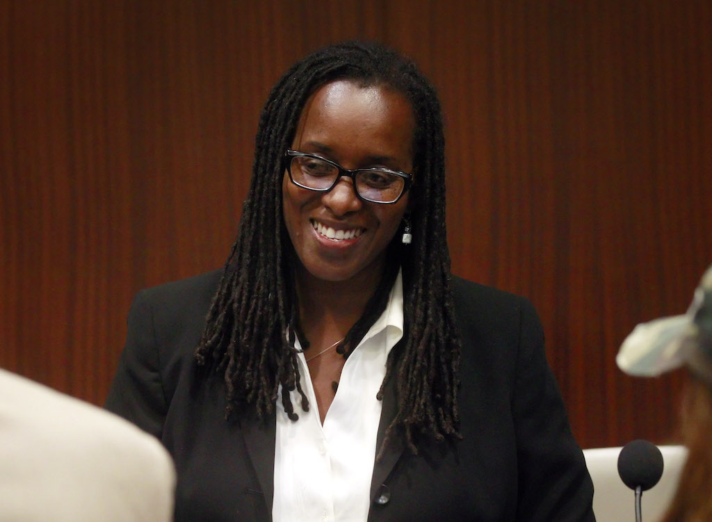 Vice Mayor Jovanka Beckles, center, speaks with supporters during a recess at the Richmond City Council meeting in Richmond, Calif., on Tuesday, July 15, 2014. Jovanka Beckles, a Richmond city councilmember who is a lesbian and native of Panama, has been