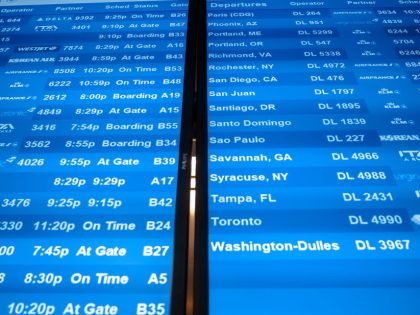 Travelers At JFK Airport Ahead Of Christmas Holiday