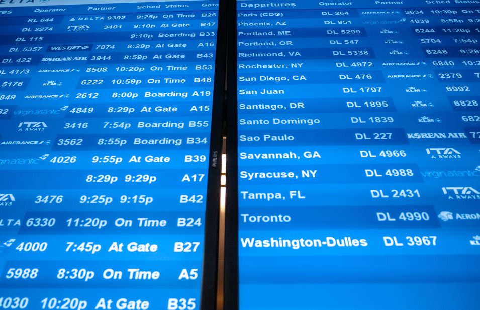Travelers At JFK Airport Ahead Of Christmas Holiday