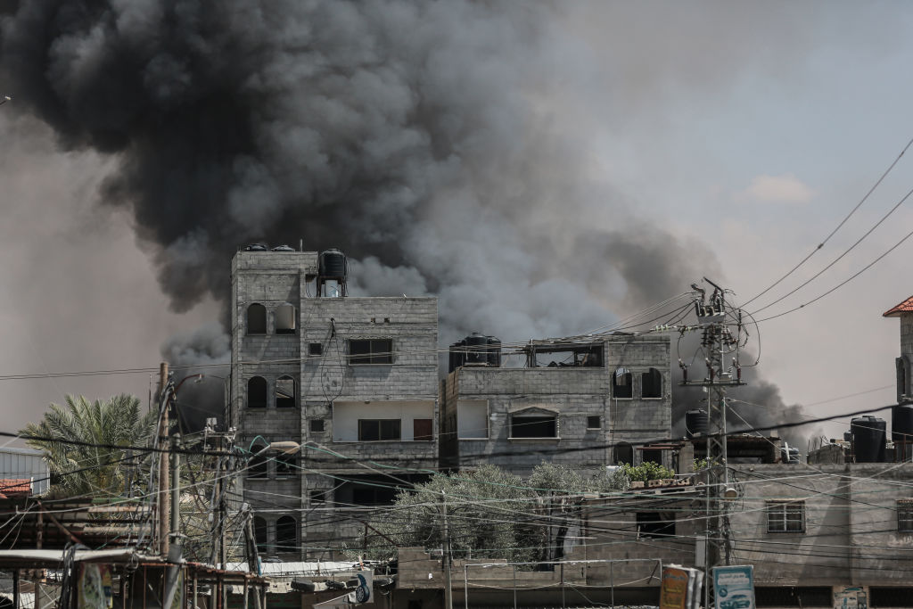 Smoke rises from shopping center following Israeli airstrike on Rafah