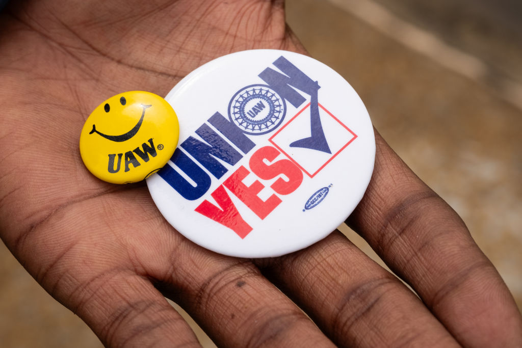 The UAW and factory workers make efforts to organize a union at the Chattanooga Volkswagon plant.