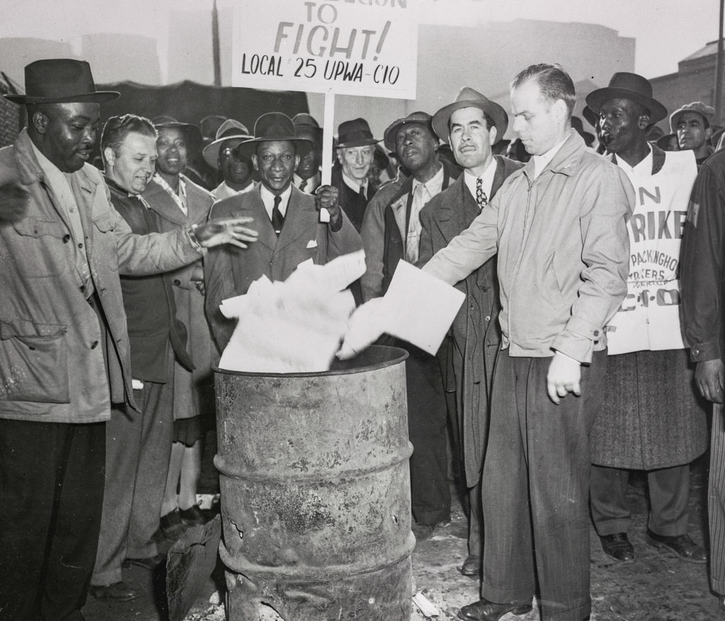 Men Burning Strike Letters