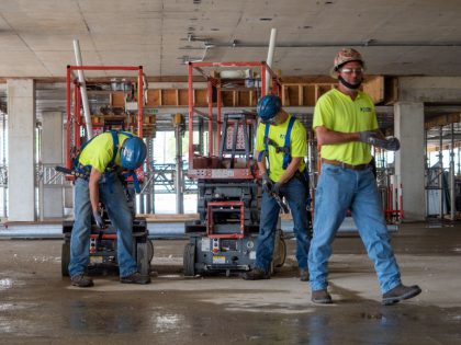 Plumbers Working On Construction Sites During Coronavirus COVID-19 Pandemic. Cincinnati, Ohio, USA