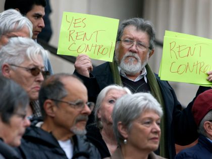 Juan Reardon and other tenants rights advocates protest in front of the Contra Costa County Courthouse before a hearing is held in Martinez, Calif. on Wednesday, Feb. 1, 2017. Richmond voters approved a rent control measure in November but a group of prop