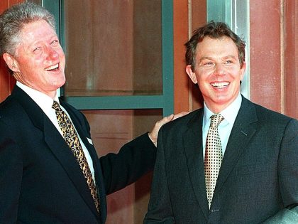 US President Bill Clinton (L) greets British Prime