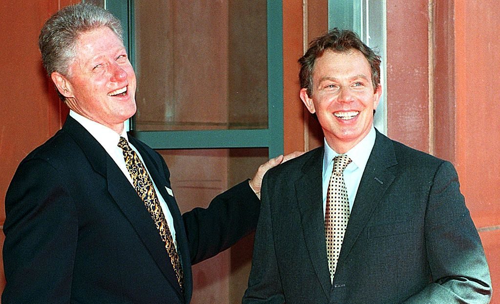 US President Bill Clinton (L) greets British Prime