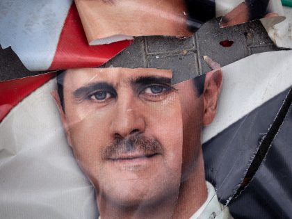 Assad Murals And Statues Defaced In Wake Of Regime's Overthrow