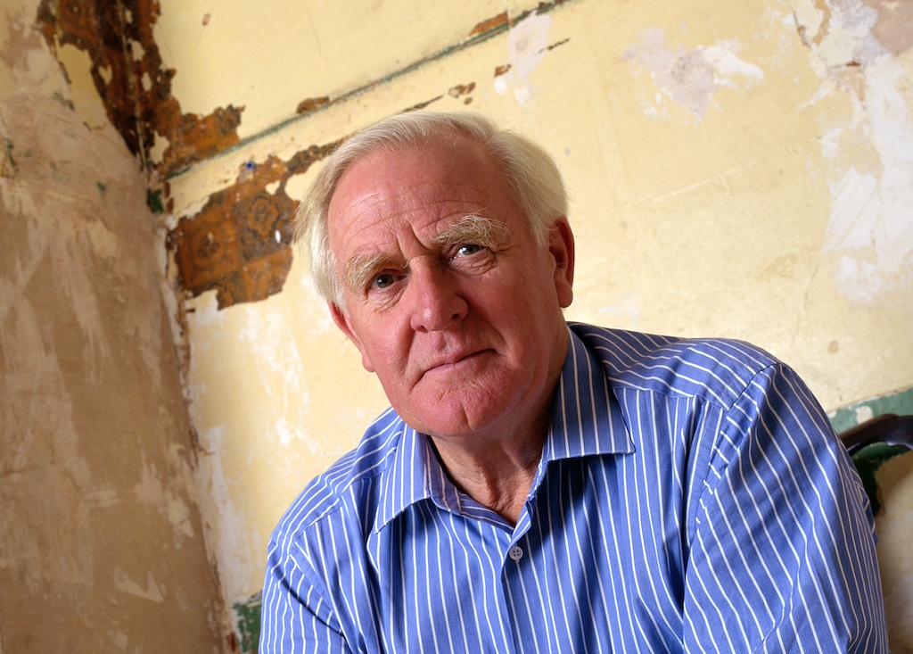 Writer John Le Carre at home