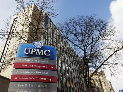 A sign points to areas on the University of Pittsburgh Medic