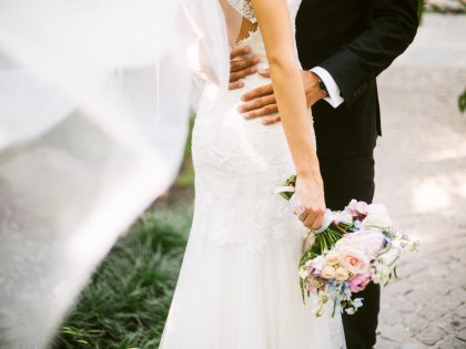 Bride and groom hugging