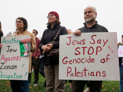 Protesters gather in Dunn Meadow at Indiana University to
