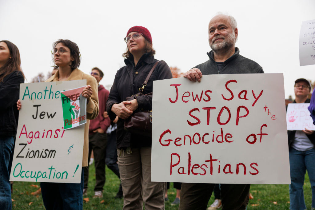Protesters gather in Dunn Meadow at Indiana University to