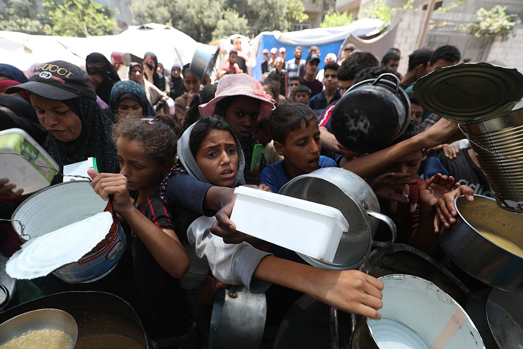 Food distributed to Palestinians in Gaza under Israeli attack and embargo