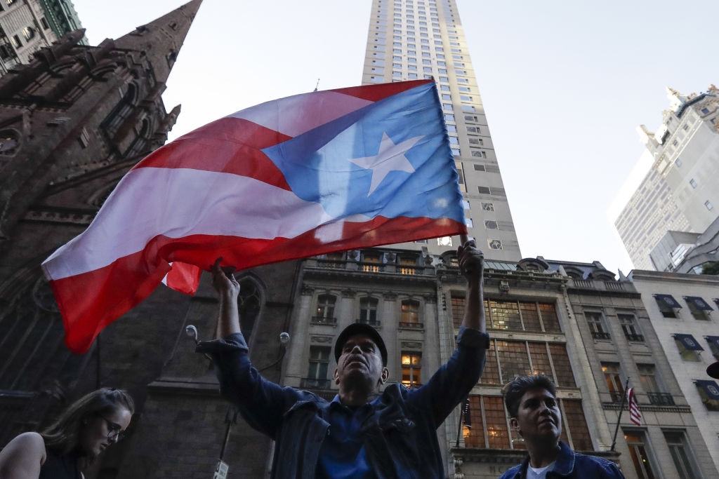 Demonstrators Attend The Call To Action On Puerto Rico Rally At Trump Tower