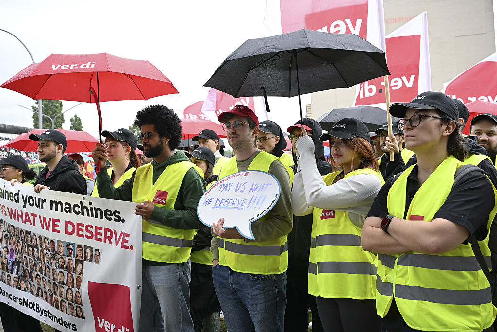TikTok employees who were laid off stage a protest in Berlin