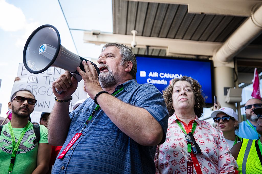 Air Canada flight attendants continue to protest after the Canada Industrial Relations Board declared the strike by the company's 10,000 flight attendants illegal and has ordered the union's leadership to direct its members to return to work.