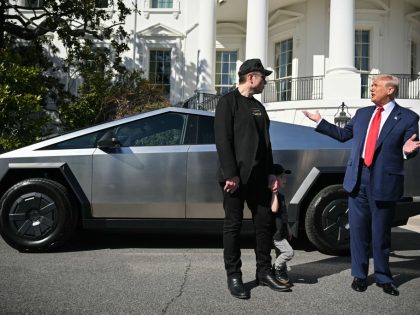 TOPSHOT-US-POLITICS-TRUMP-TESLA