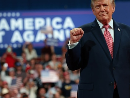 President Donald Trump greets supporters during a campaign rally at Heartland Credit Union Arena on October 19, 2026, in Park City, Kansas.