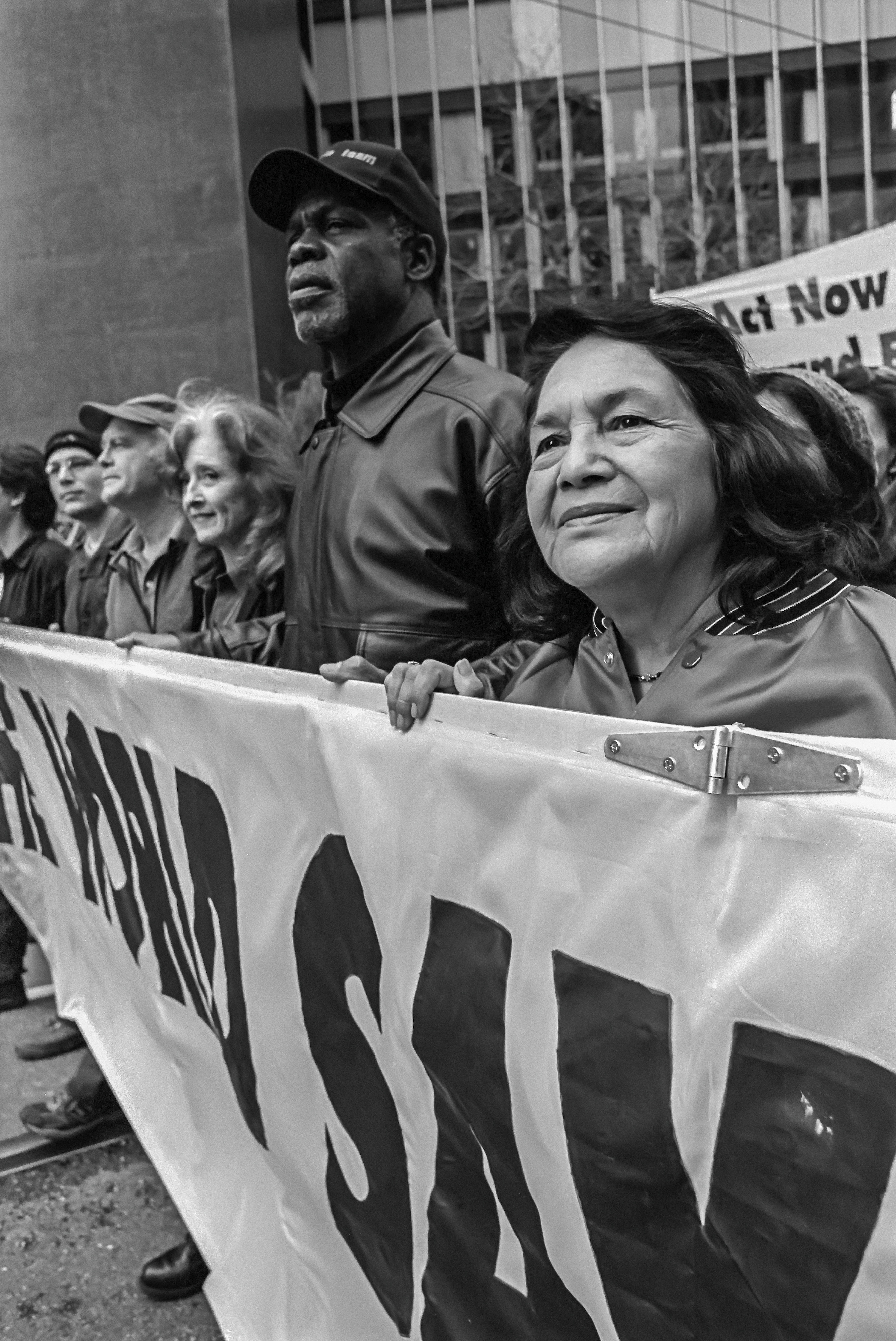 Dolores Huerta, with Danny Glover and others, demonstrating against the Iraq War.