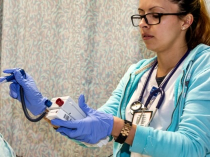 A nurse with a patient at Mount Sinai Medical Center in Miami Beach, Florida.