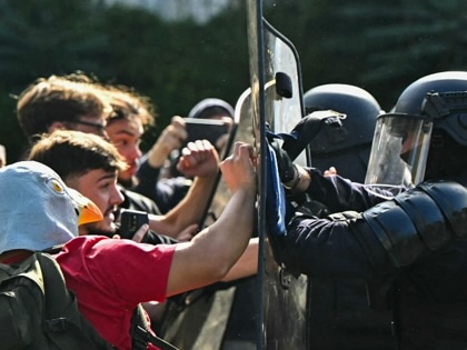 Anti-riot police officers face protesting students carrying out blockading action outside the secondary school Le Corbusier, in Aubervilliers, northern Paris on October 1, 2026. 