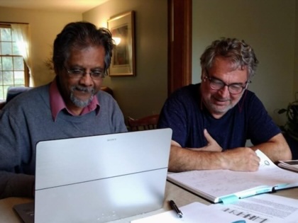 Anwar Shaikh and E. Ahmet Tonak work together at Tonak’s house in Massachusetts, 2017.