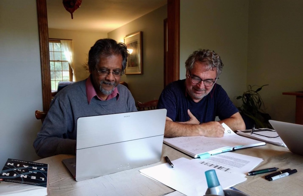 Anwar Shaikh and E. Ahmet Tonak work together at Tonak’s house in Massachusetts, 2017.