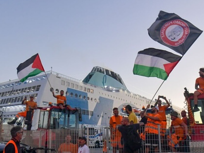 Dockworkers of the port of Livorno block a ship during a rally of pro-Palestinian protesters on September 5, 2025, in Livorno, Italy.